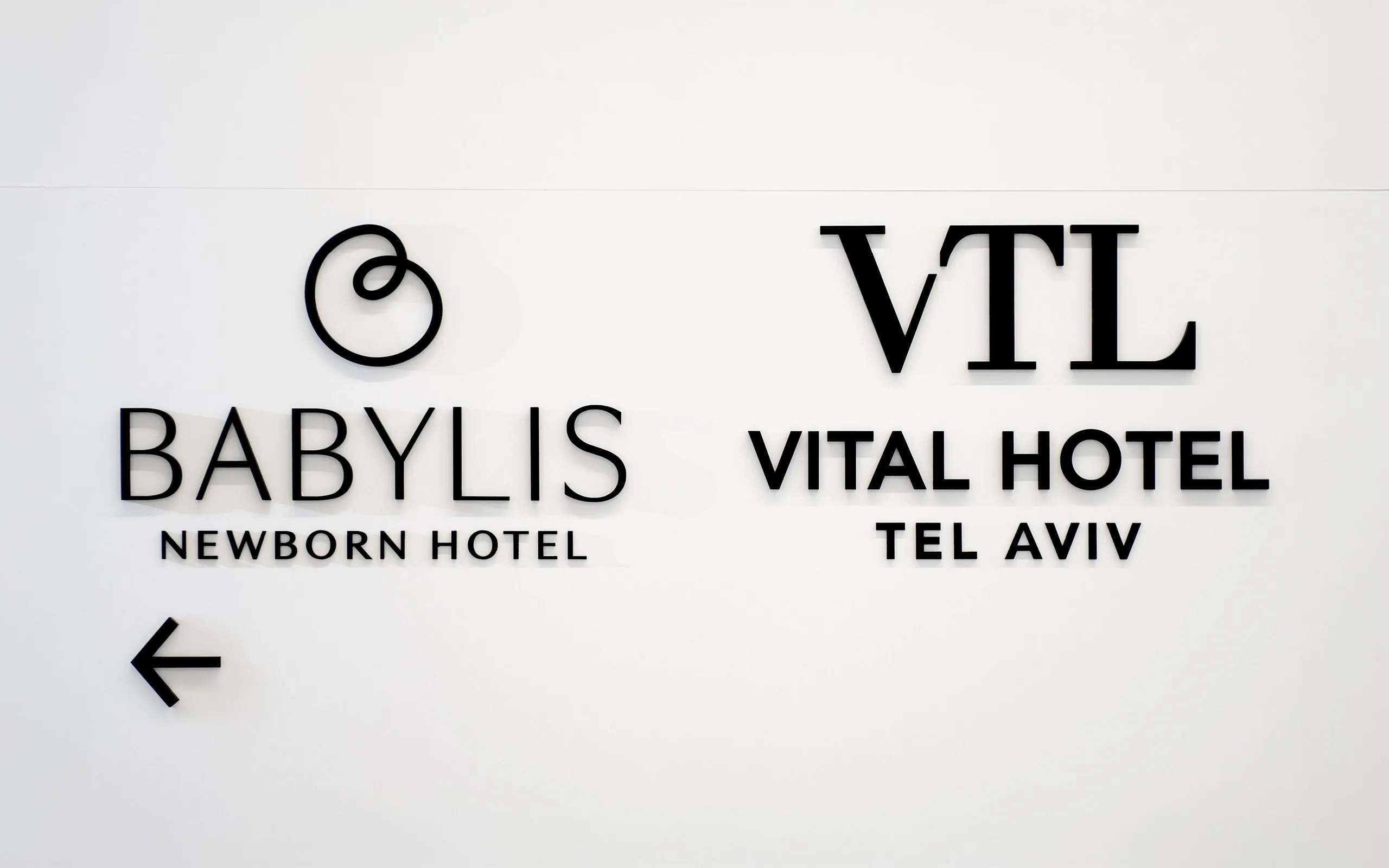 Baby Lis Hotel – signage design by Basman/Tenenbaum