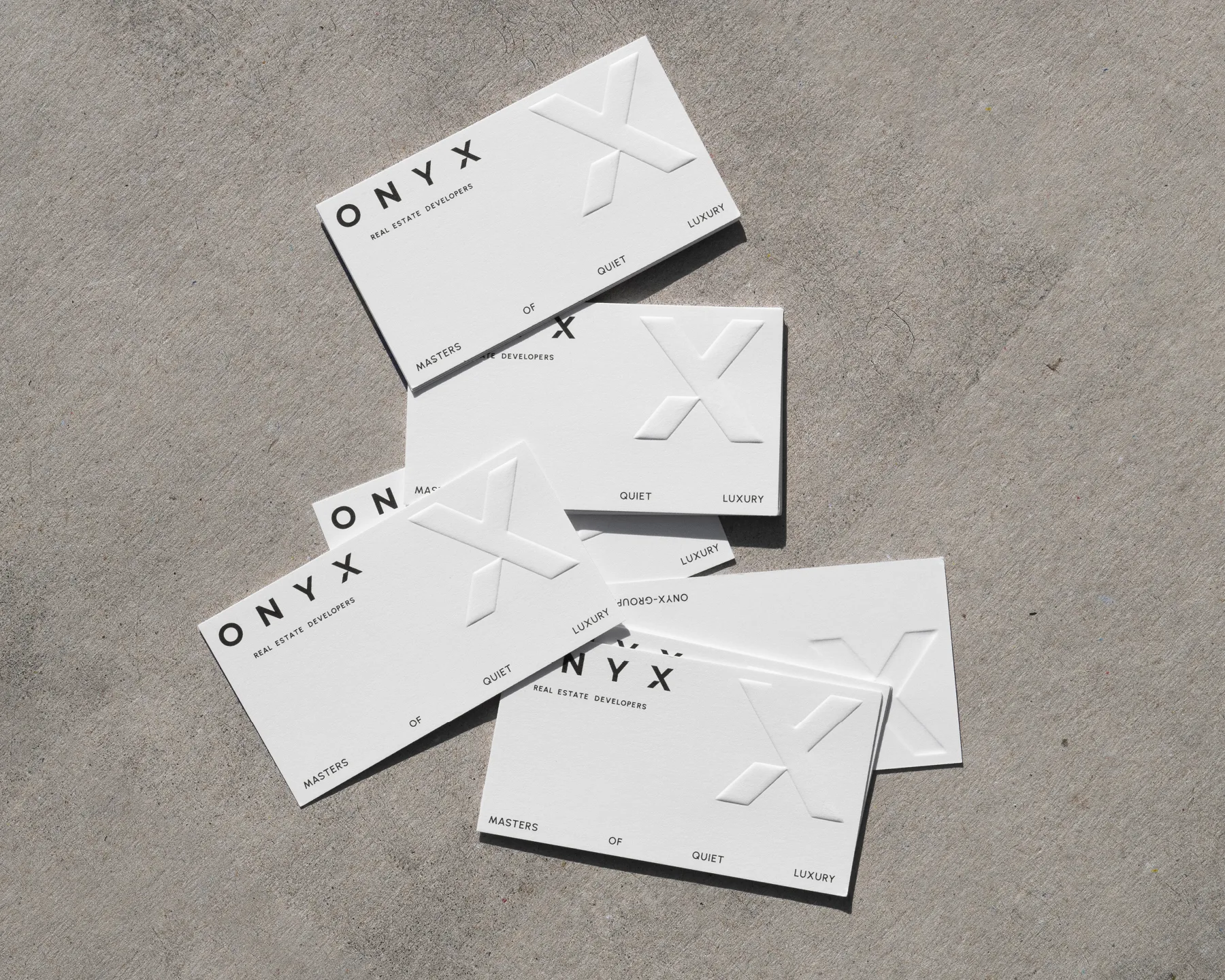 ONYX Real Estate Developers – brand identity and web design by Basman/Tenenbaum