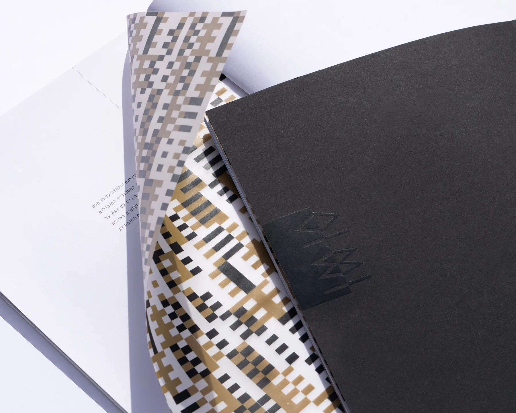 ALMI – brand identity and print design by Basman/Tenenbaum