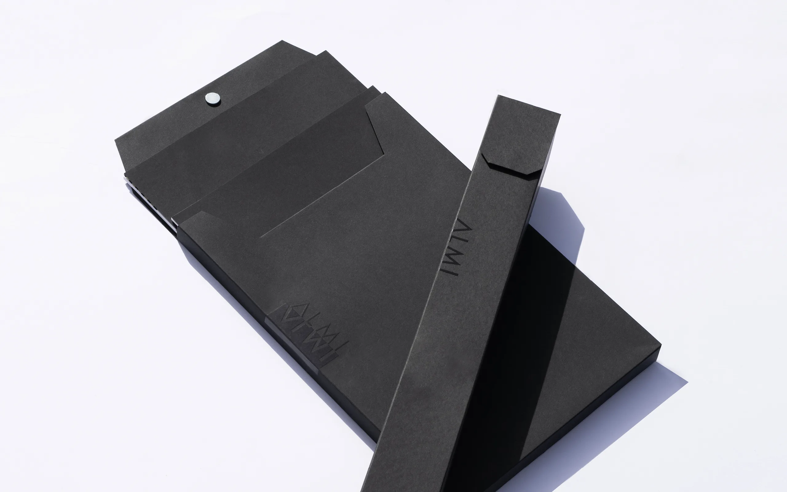 ALMI – brand identity and print design by Basman/Tenenbaum