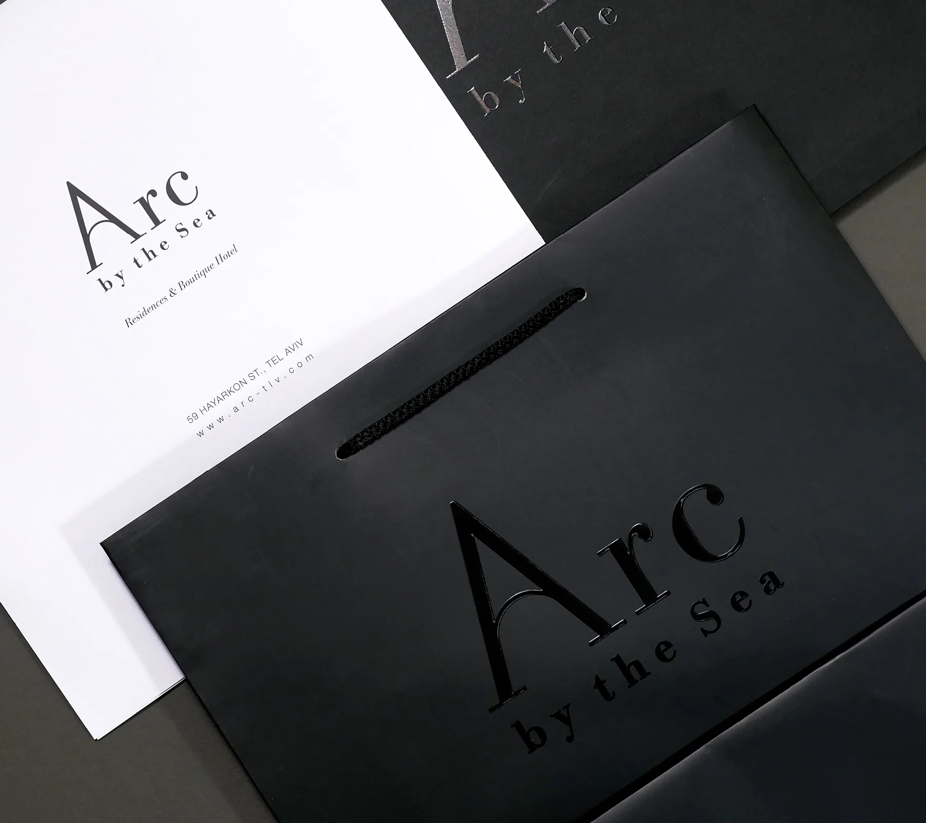 Arc by the sea, Tel Aviv – brand identity and print design by Basman/Tenenbaum