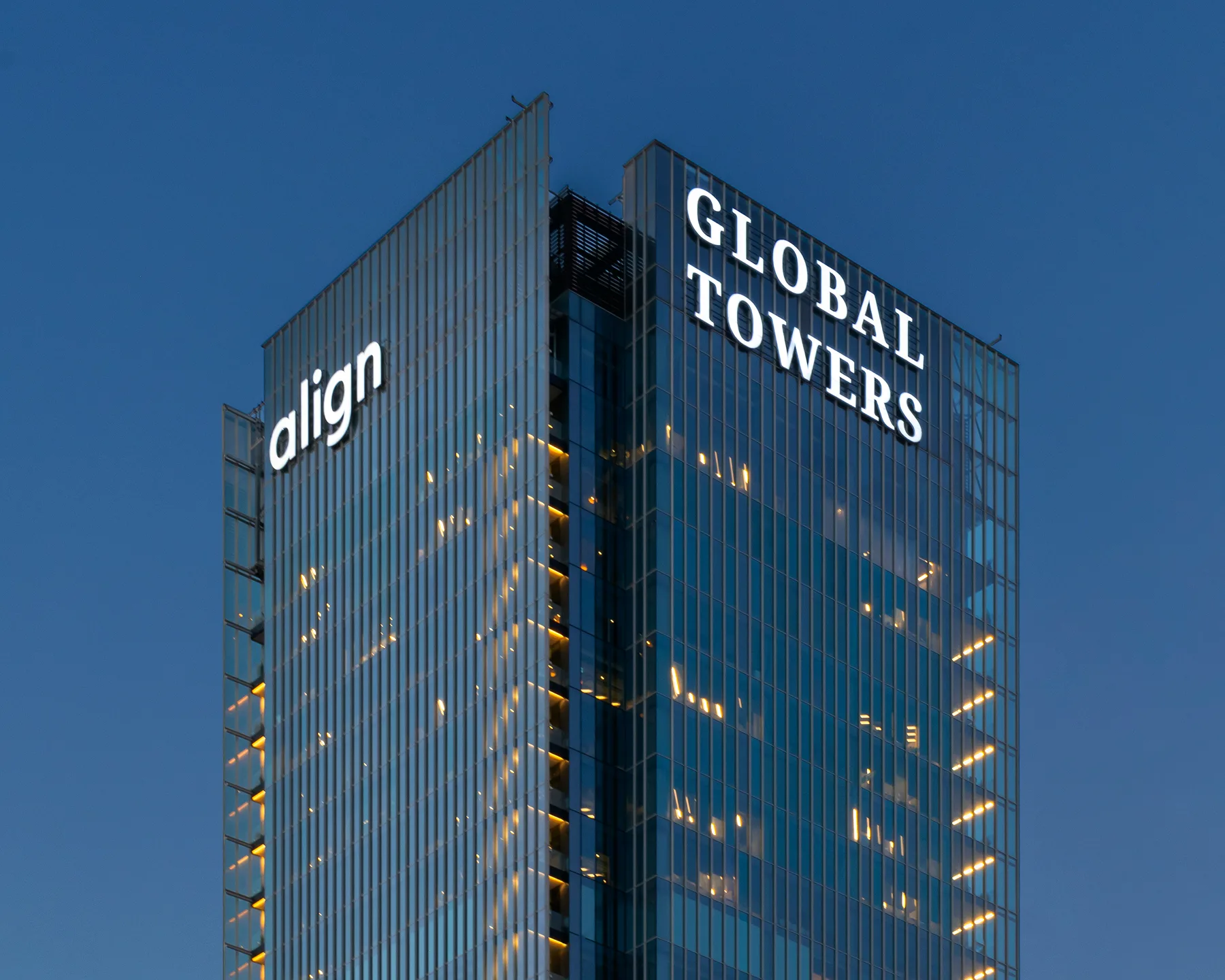 Global Towers – signage design by Basman/Tenenbaum